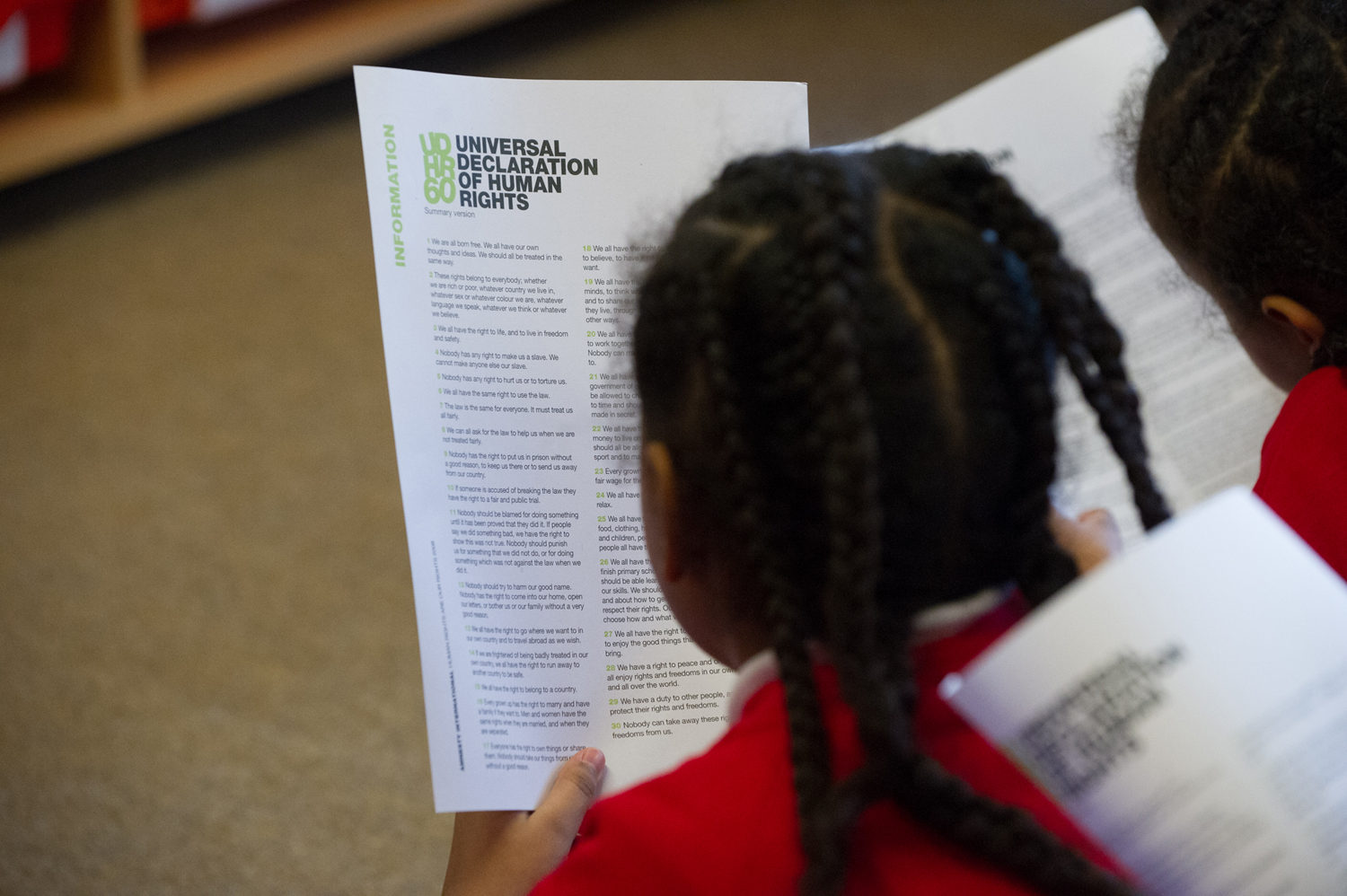 Children reading the Universal Declaration of Human Rights