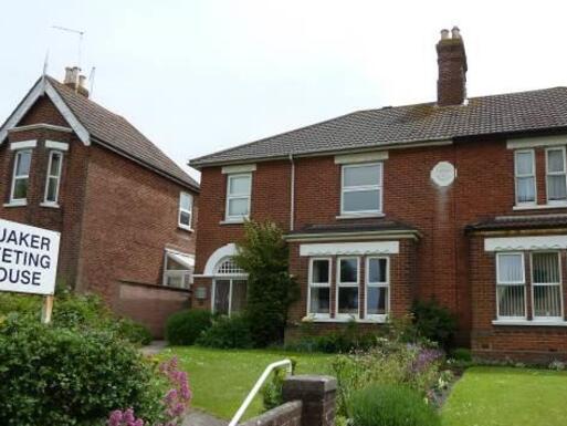 Semi-detached Victorian house quite big house and front garden.