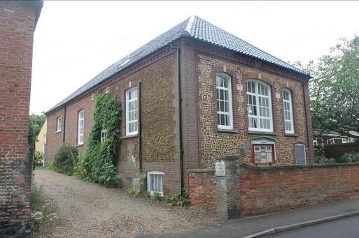 Late Georgian building for Quakers use with small boundary wall.