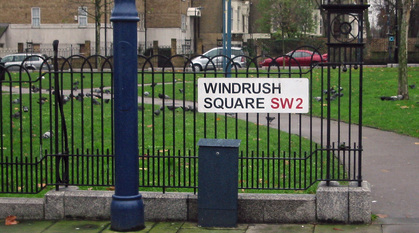 A street sign by a square