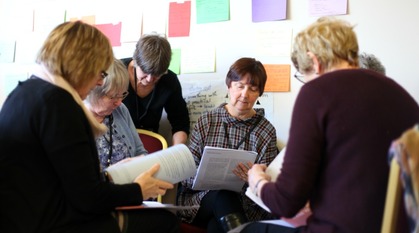 A group of women in a workshop.