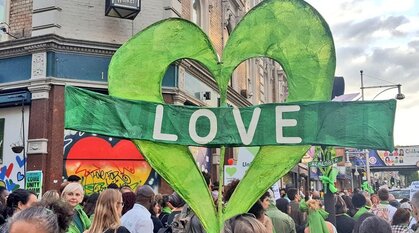 Green grenfell love heart placard