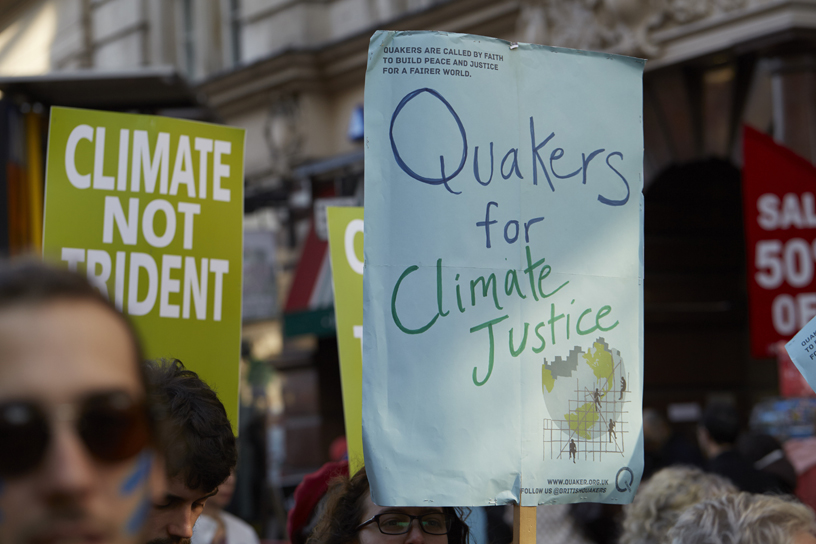 Placards say climate justice