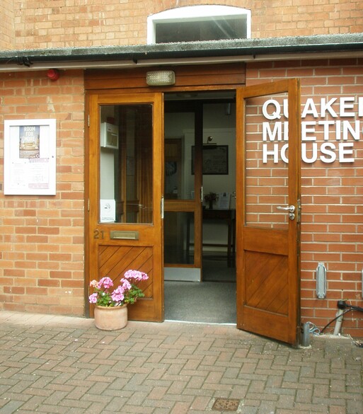 Open doorway on red brick building.