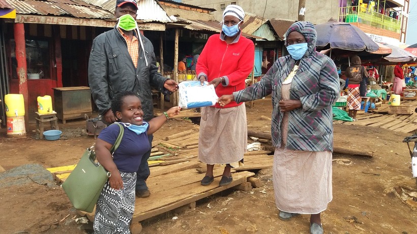 Donating facemasks to the local market community in Langas, Kenya. Photo: TTT Kenya