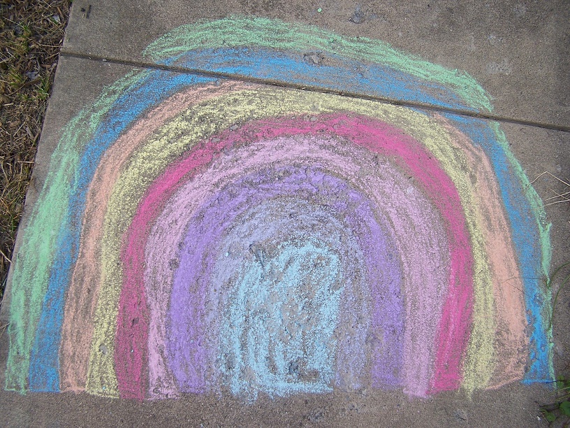 rainbow drawn in chalk, symbol of hope