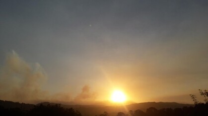 sun over an escarpment