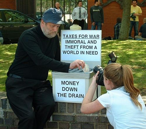 Taxes for war: immoral and theft from a world in need. Robin Brookes at a demo called money down the drain