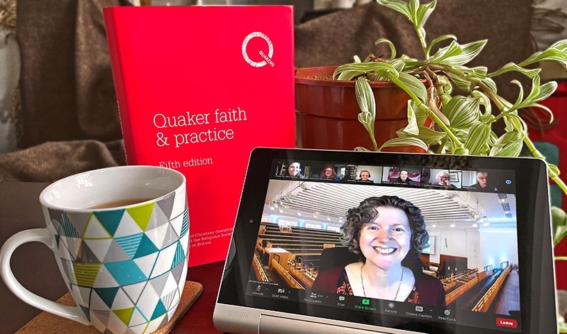 Clare teacup, plant and red Quaker faith and practice