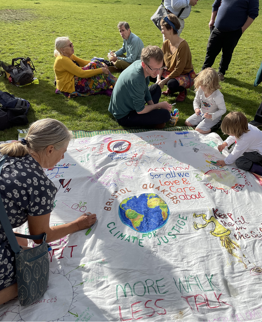 All ages making Quaker banner for COP26