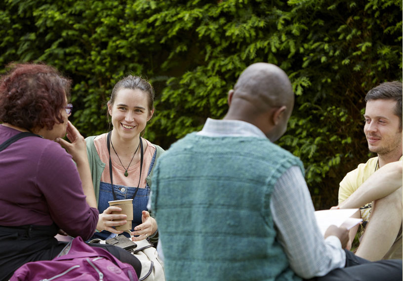 People chatting and smiling