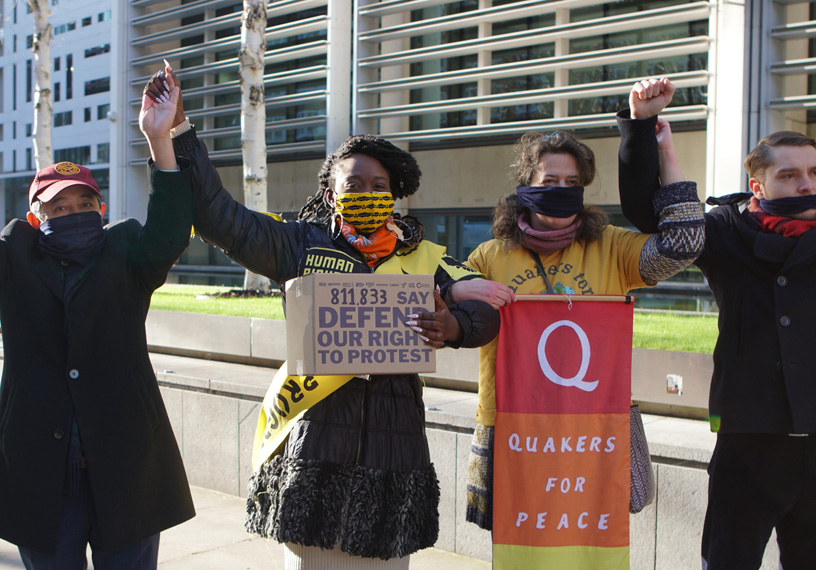 Protestors with linked arms