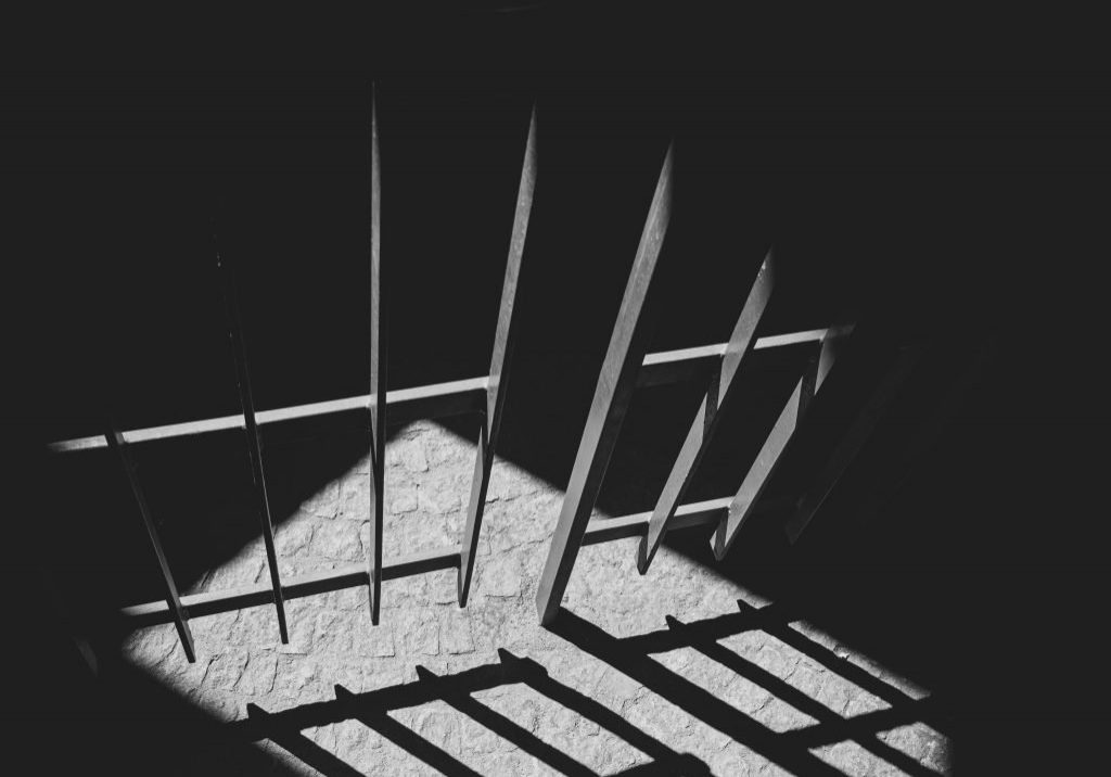 Image with prison bars and shadows