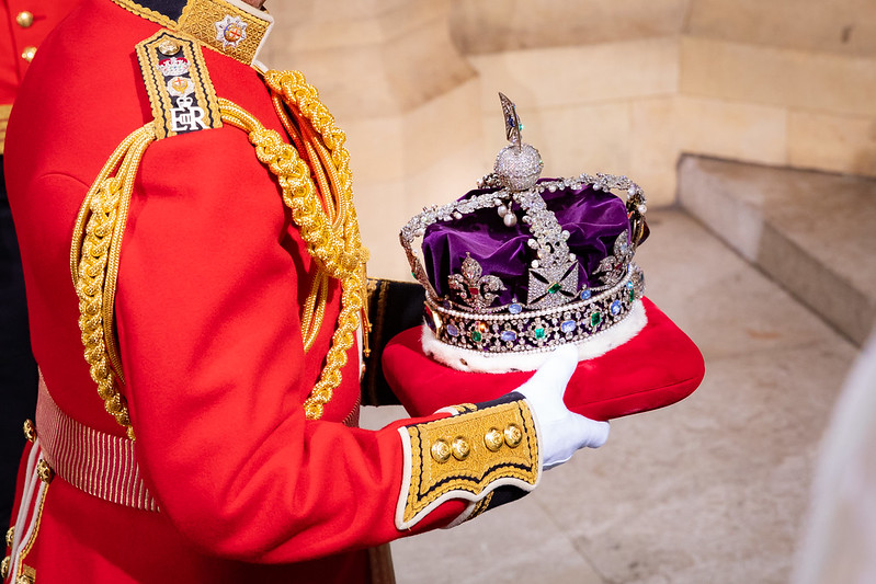 The Imperial State Crown at the state opening of Parliament carried on its own cushion by a member of the royal household