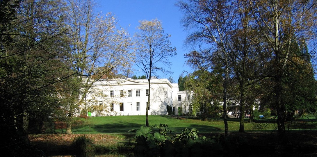 A photo of the back of the Woodbrooke Centre in its grounds