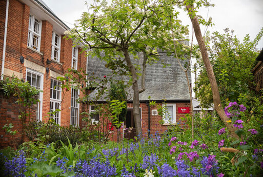 One storey red brick building.