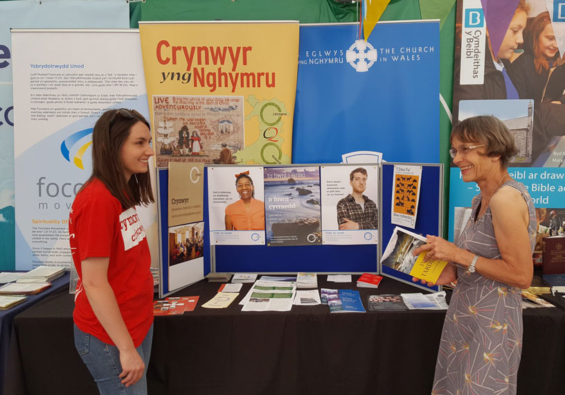 A table of outreach materials in Welsh and in English