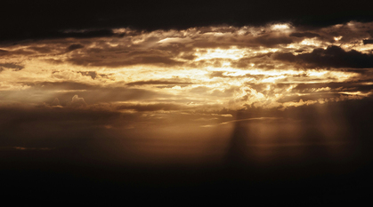 Light breaking through clouds