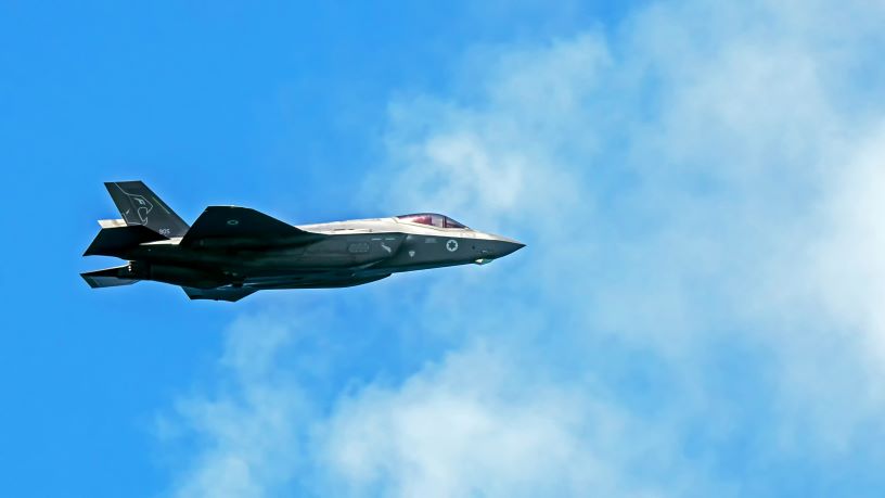Fighter jet against blue sky