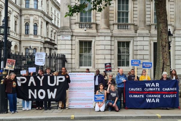 people with banner in Whitehall