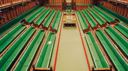 The green benches of the House of Commons in the UK Parliament