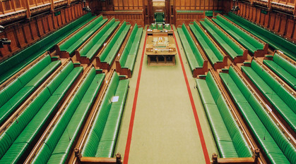 The green benches of the House of Commons in the UK Parliament