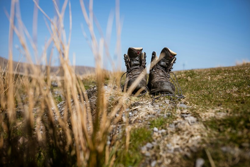 A pair of walking boots in the mountains