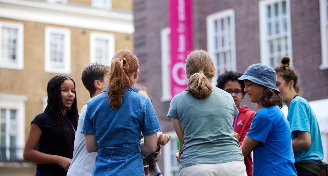 backs of young people playing game