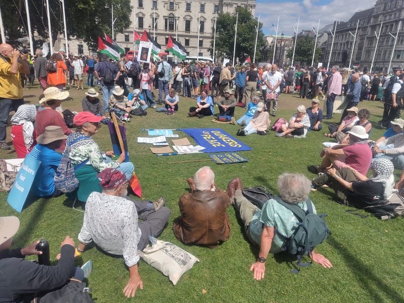 People sitting on grass in circle