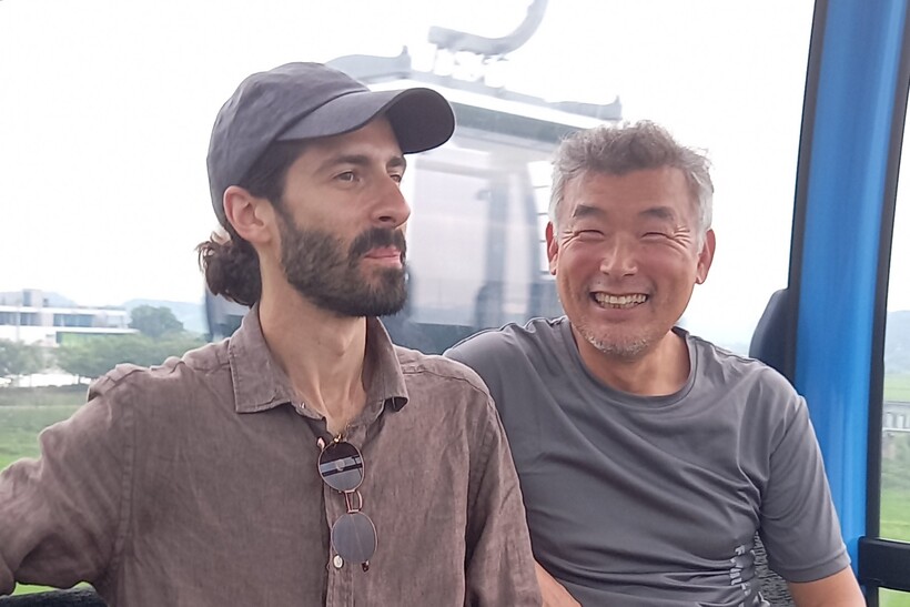 Bongsoo (right) with Paolo, the drummer in David’s band. A cable car takes us to the opposite bank of the Imjin River across emerald paddy fields to eerily peaceful – and mined – vistas where once the cold war's bloodiest conflict had reigned.