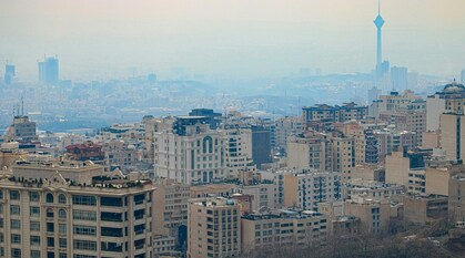 View over Tehran from the Tochal Climbing Entry. A haze is settled over the city. 
