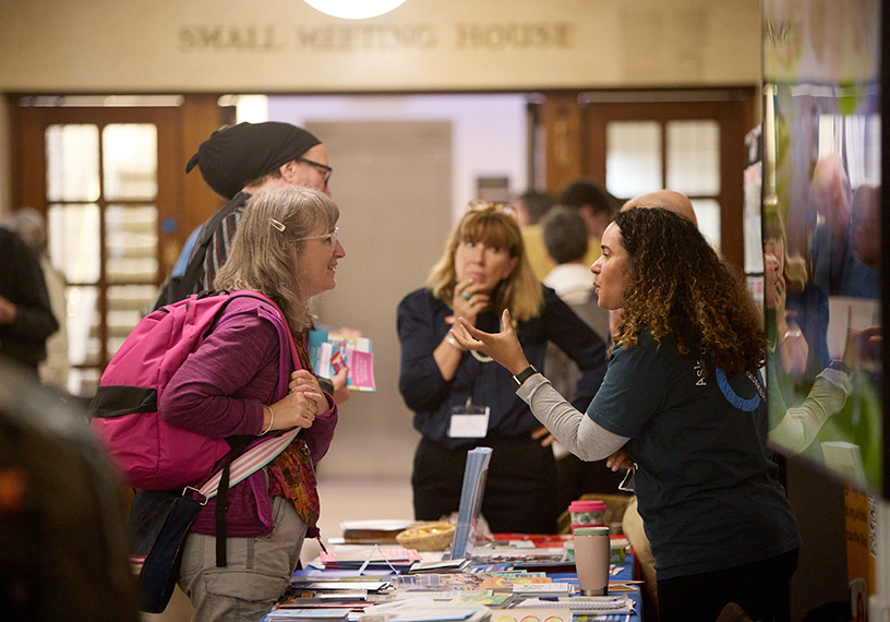 People engaged in animated conversation